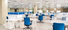 office space with blue chairs 